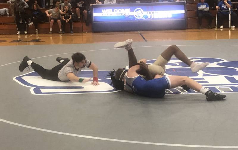 Princeton's Casey Etheridge works on a pin against Morris Tuesday night at Prouty Gym.
