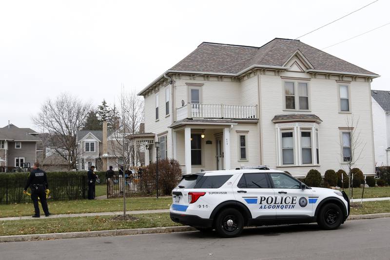 Police investigate at the residence of 408 La Fox River Drive on Wednesday, Dec. 1, 2021, in Algonquin. The bodies of a man and a woman were found about noon Wednesday after a well-being check on La Fox River Drive the day before, according to Algonquin police.