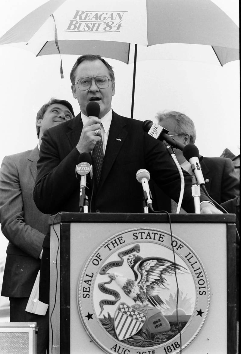 Former Illinois Gov. Jim Thompson speaks to a crowd of people gather during the grand opening of the Illinois Valley Regional Airport on Friday, Oct. 18, 1985 in Peru