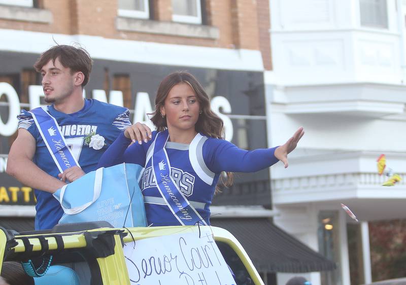 Senior court attendants Gavin Lanham and Sylvie Rutledge ride during the Princeton High School homecoming parade on Thursday, Sept. 25, 2025 along South Main Street in Princeton .
