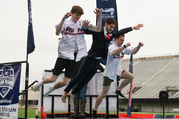 Participants take the Polar Plunge at Huskie Stadium