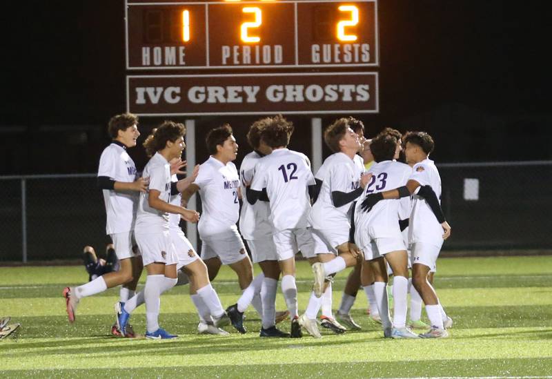 Members of the Mendota soccer team celebrate after defeating Peoria Christian during the Class 1A Sectional game on Wednesday, Oct. 30, 2024 at Chillicothe High School.