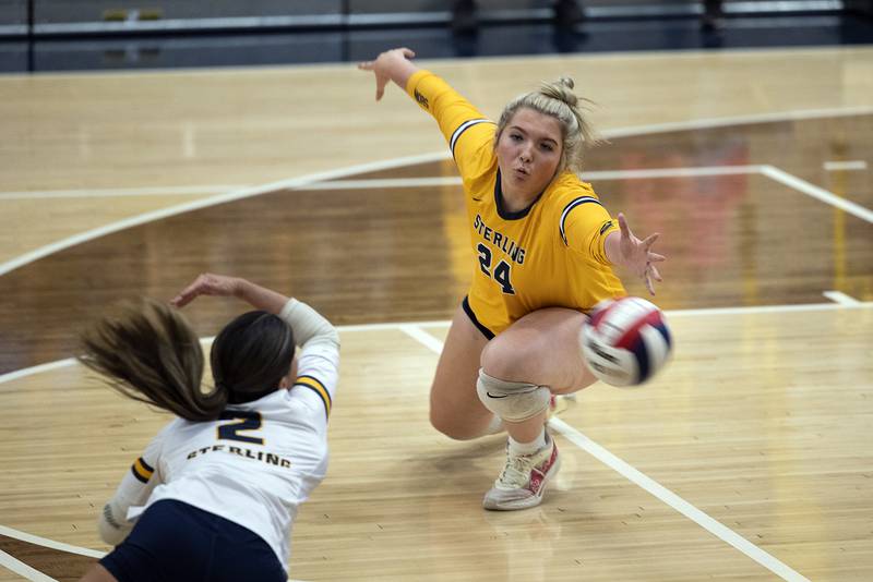 Sterling’s Carley Sullivan reaches for a shot against Alleman Tuesday, Oct. 22, 2024, in Sterling.
