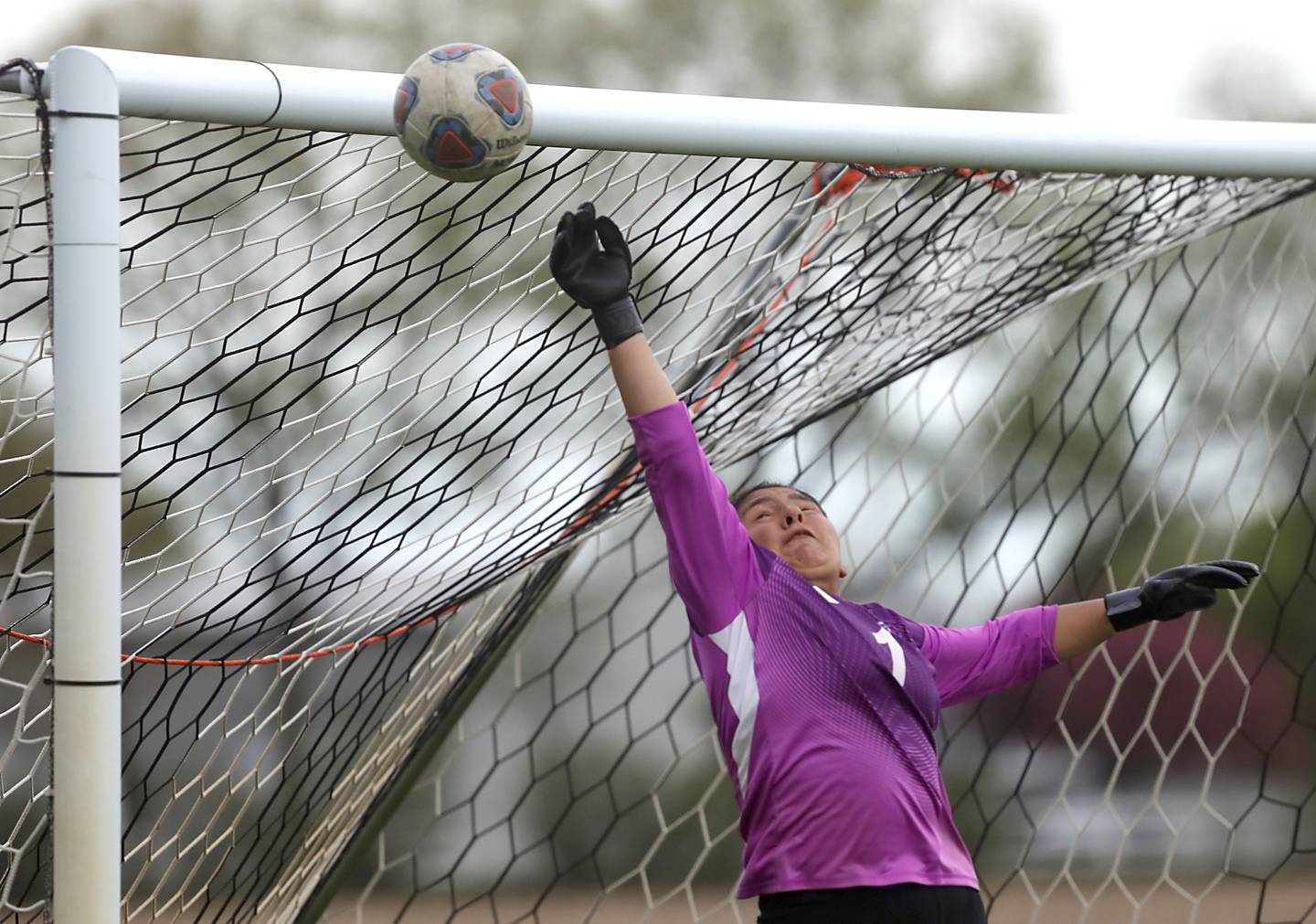 Harvard's Jarithsie Mercado Vergara knocks a shot on goal over the cross bar during a Kishwaukee River Conference soccer match against Johnsburg on Wednesday, April 27, 2026, at Johnsburg High School.