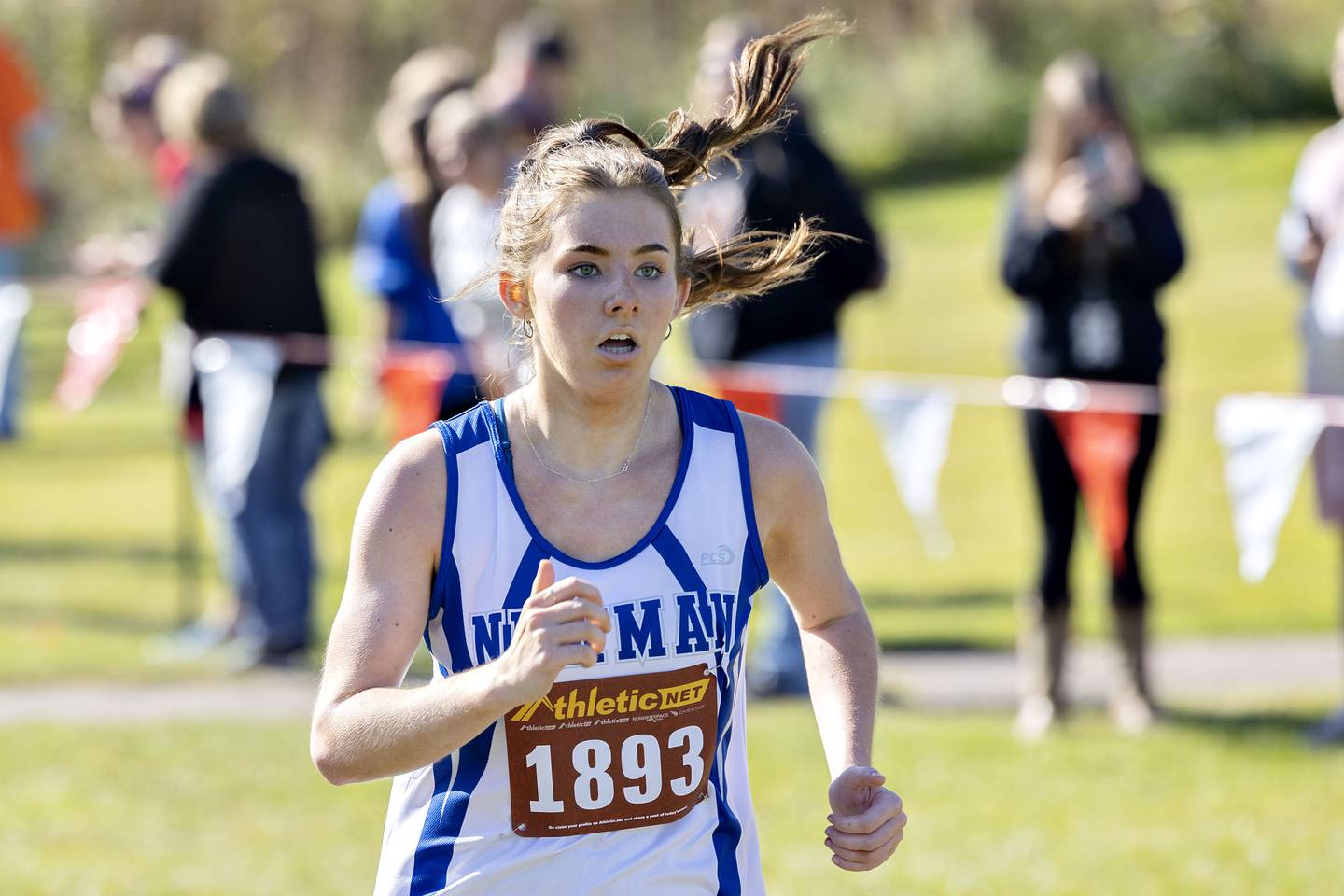 Newman’s Claire Crisham takes 47th in the girls varsity race at the Amboy Columbus Day Invitational Monday, Oct. 10, 2022.