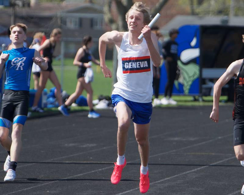 Geneva's Karl Gattinger competes in the Boy's 4x100 Relay at the 31st Annual Mike VanDeveer Track and Field Invitational on Saturday April 15,2023 in Geneva.
