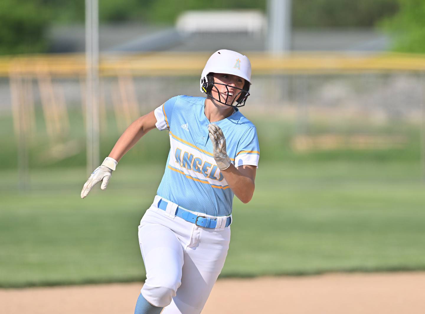 Joliet Catholic's Madison Patrick rounding the bases to home plae during the regional semifinal game against Crete Monee on Tuesday, May. 23, 2023, at New Lenox.