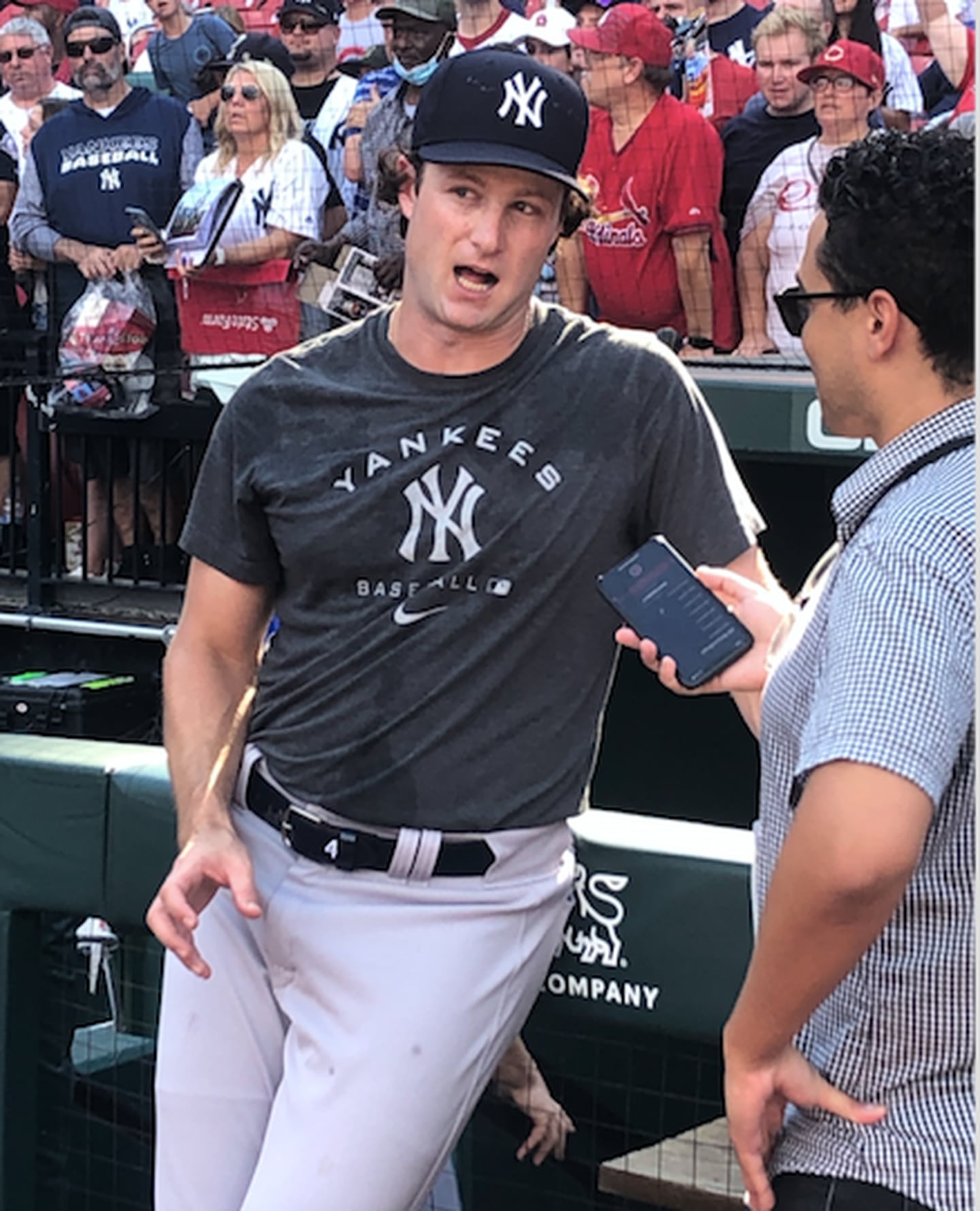 Yankees pitcher Garrett Cole talks to a reporter prior to Saturday's game about his return to St. Louis.