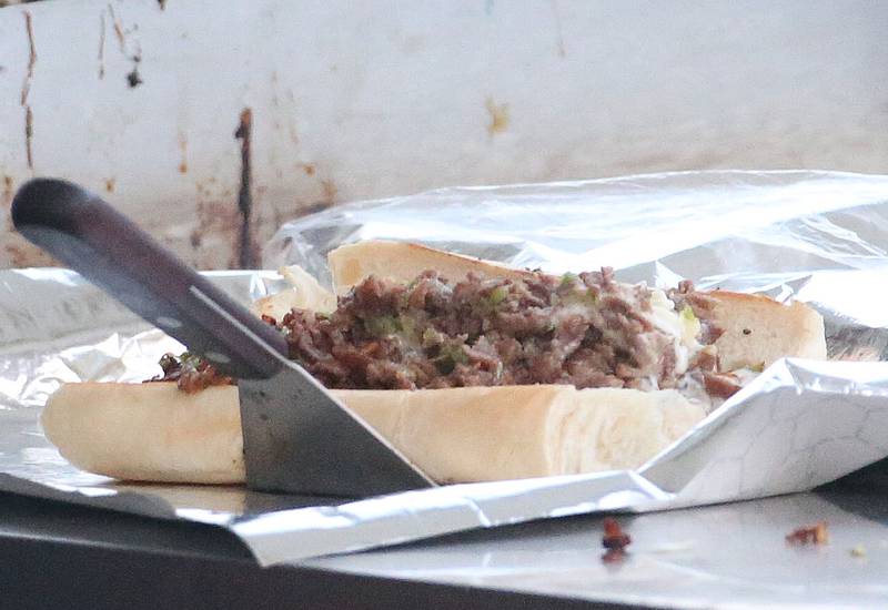 A Philly cheesesteak sandwich made by the Philly Factory vendor is ready for a customer during the Taste of the Illinois Valley festival on Saturday, Aug. 3, 2024 at Centennial Park in Peru.