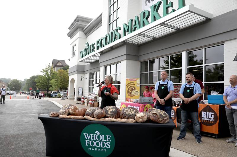 Whole Foods Store Team Leader Kristi Malicoat speaks during the grand opening celebration on Wednesday, June 25, 2025 at the new Whole Foods Market in St. Charles.