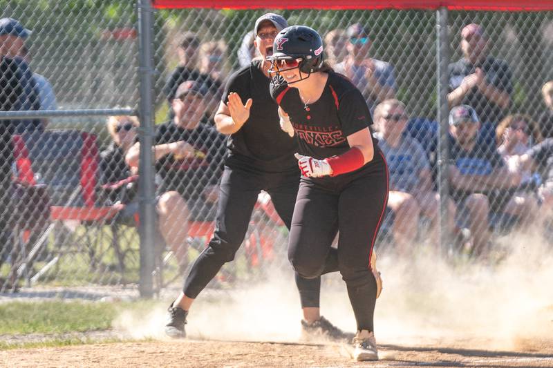 Yorkville's Samantha Davidowski (7) rounds third base after hitting a homer against Plainfield North during the Class 4A Yorkville Regional softball final at Yorkville High School on Friday, May 26, 2023.