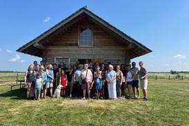 Descendants of Goose Lake cabin founder gather at historic replica