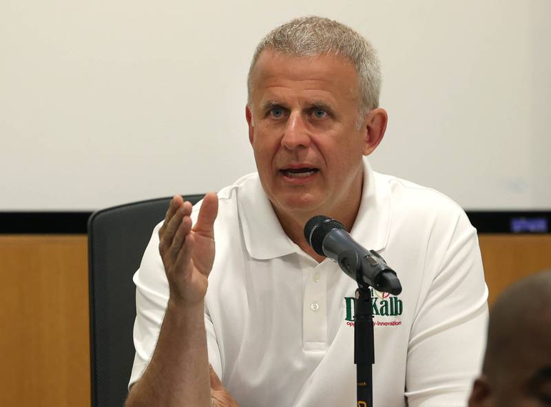 DeKalb Mayor Cohen Barnes thanks retiring DeKalb Fire Chief Mike Thomas for his service Monday, June 23, 2025, during the DeKalb City Council meeting at the DeKalb Public Library.