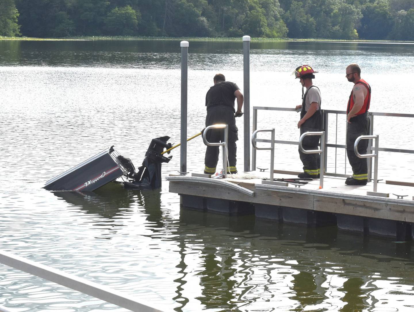 Morrison firefighters work to pull a truck, boat and trailer from the lake at Morrison Rockwood State Park near Morrison on Friday, July 18, 2025. No one was injured after the truck accidentally entered the lake at the boat ramp.