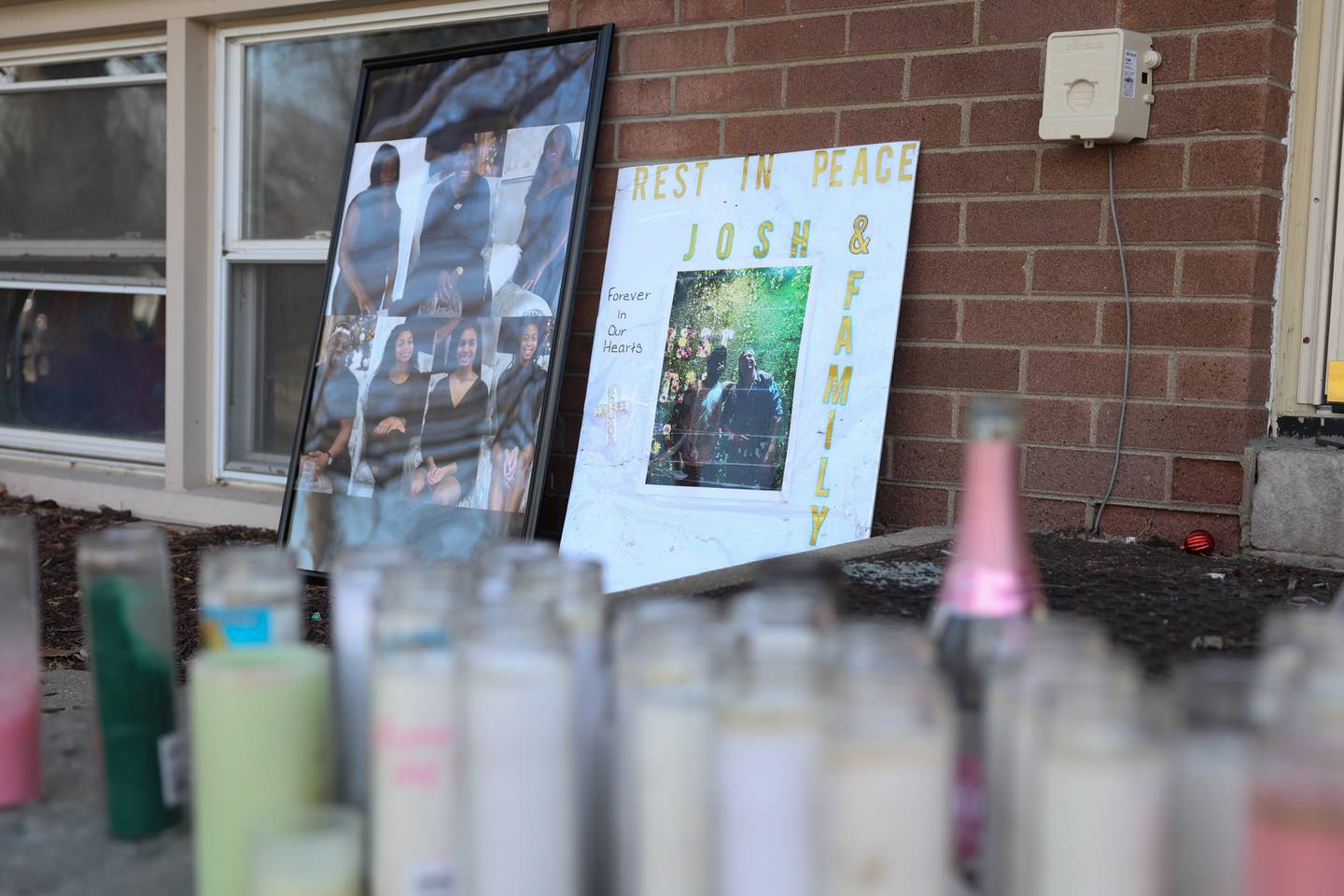 Photos of the victims sits on the porch of their home from Romeo Nance mass shooting on Thursday, Feb. 8th 2024 in Joliet.