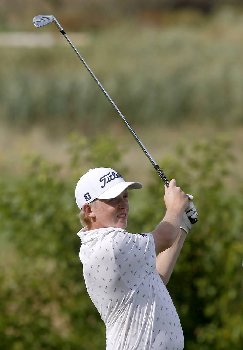 Rochelle's Ian Metzger watches his tee shot on the eighth green during the IHSA Class 2A Crystal Lake South Boys Golf Regional on Wednesday, Oct. 1, 2025 at RedTail Golf Club in Lakewood.