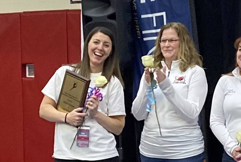 Downers Grove co-op head coach Kristyn Campos (left).