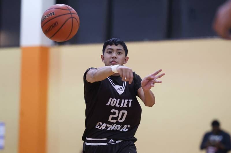 Joliet Catholic’s James Pilapil paste the ball against Prespectives in the Class 2A Julian Sectional championship on Friday, March 3rd, 2023 in Chicago.