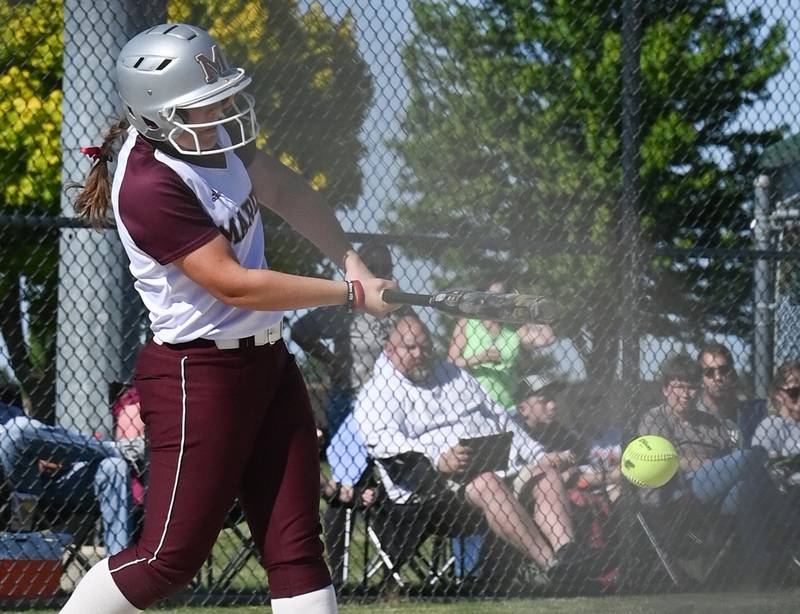 Marengo's Alyssa Pollnow puts the ball in play Friday against Rock Falls during the Class 2A Stillman Valley Sectional championship game.