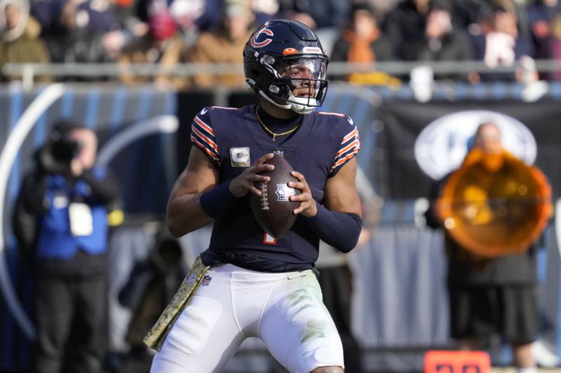 Chicago Bears quarterback Justin Fields looks to pass during the second half against the Detroit Lions, Sunday, Nov. 13, 2022, in Chicago.