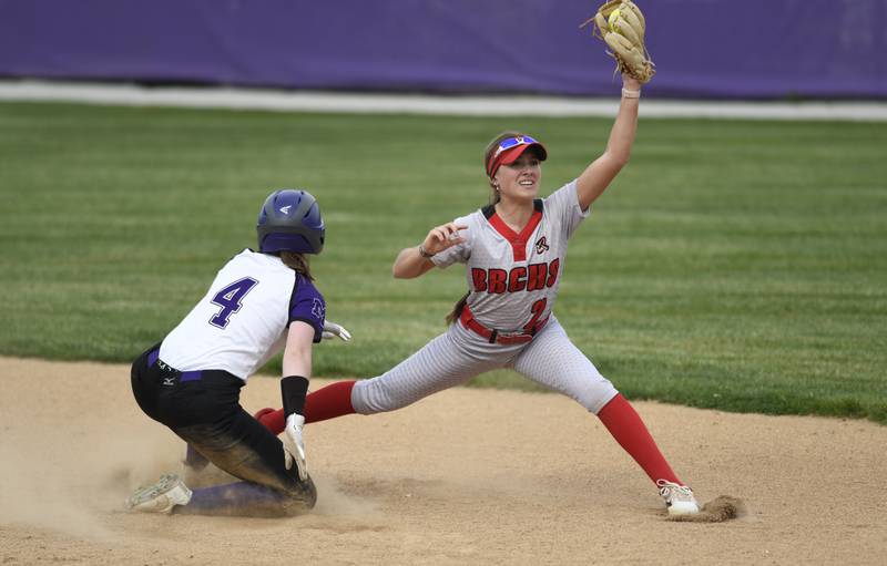 Bradley-Bourbonnais' Shannon Lee looks for the call at second base as Manteno's Julie Ott slides in safely in the second inning of a game on Thursday, May 15, 2025.