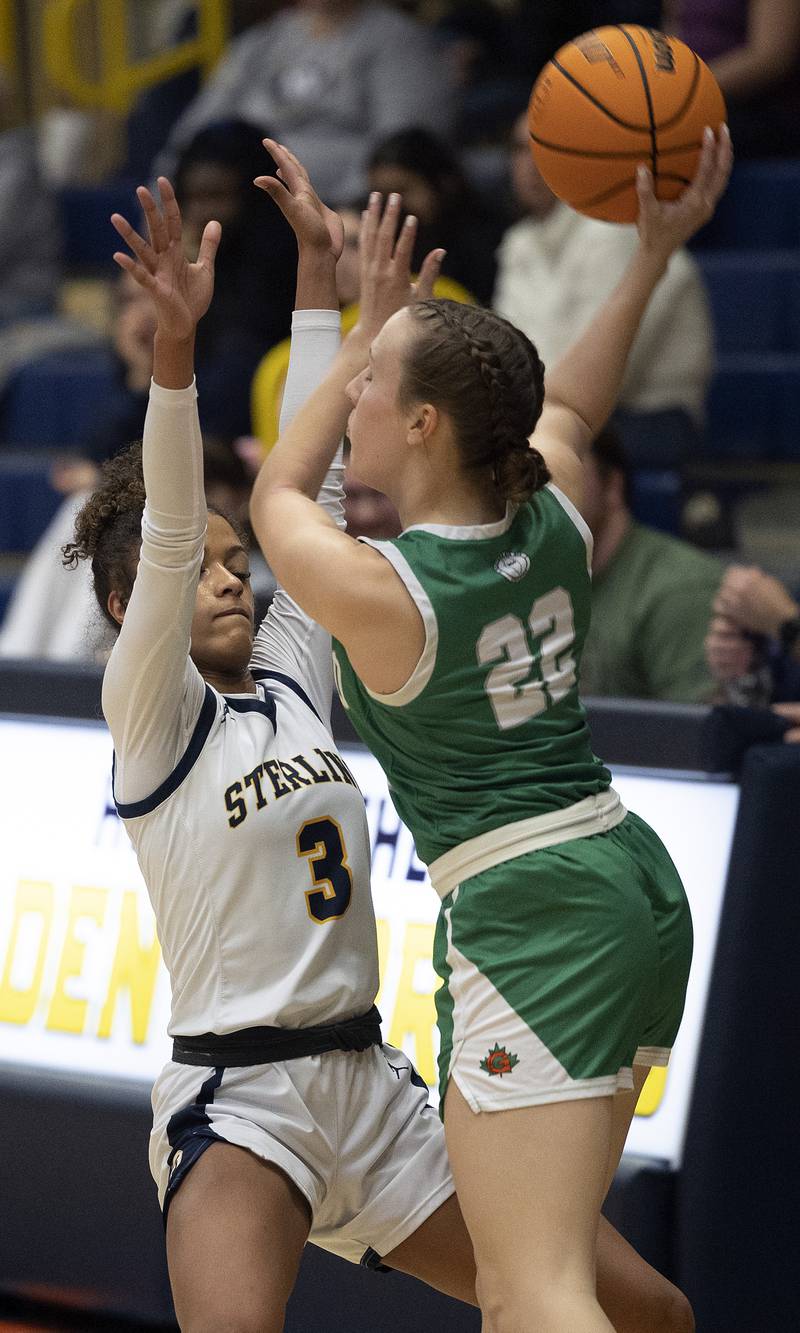 Sterling’s Delali Amankwa works to guard Geneseo’s Viola Pettit Thursday, Jan. 30, 2025, at Sterling High School.