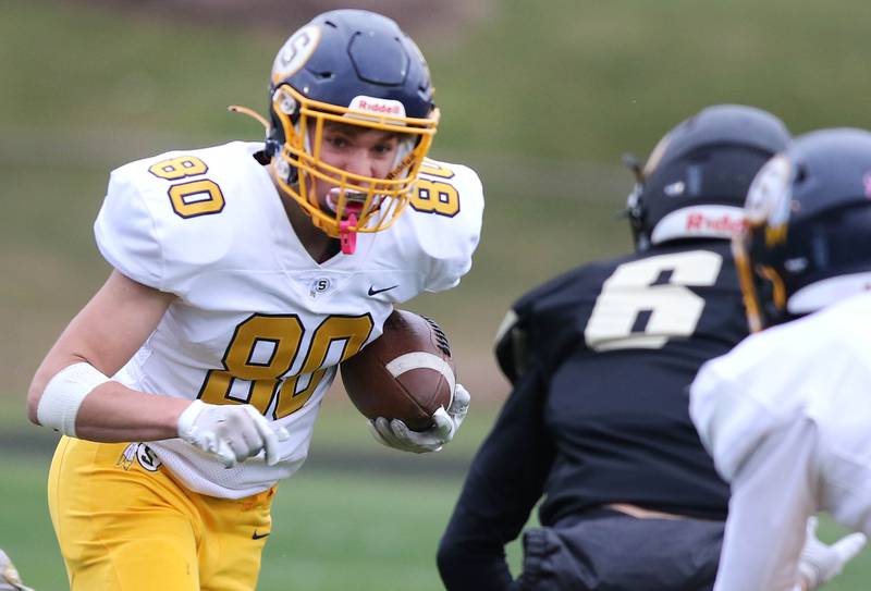 Sterling's Justin Null looks to get by Sycamore's Carter York during their Class 5A state playoff game Saturday, Nov. 12, 2022, at Sycamore High School.