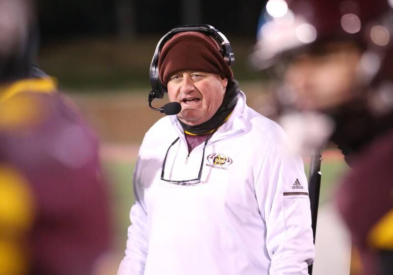 Montini Catholic head coach Mike Bukovsky talks to his players while playing Monticello during the Class 3A State football championship on Friday, Nov. 29, 2024 at Hancock Stadium in Normal.