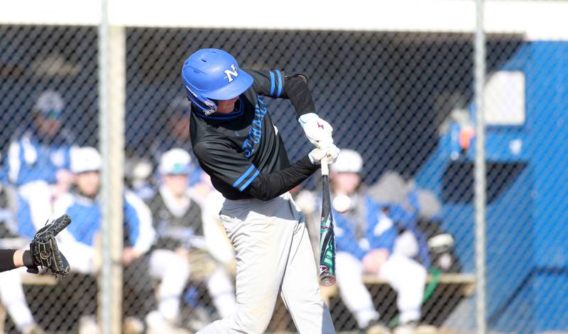 St. Charles North’s Julian Harmon makes contact during a game on Tuesday, April 8, 2025 at Burlington Central.