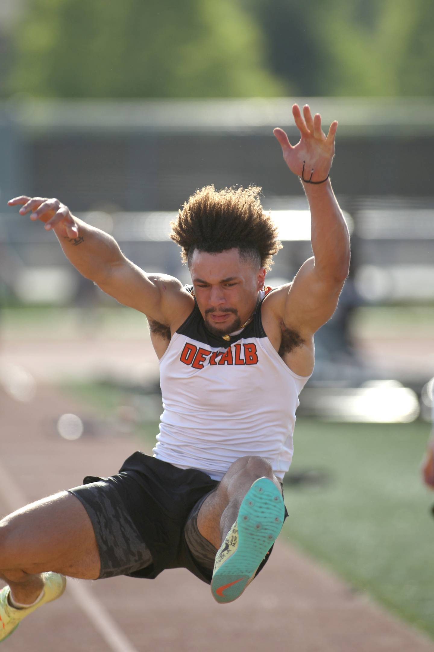 DeKalb’s Toriano Tate competes in the long jump during the Class 3A St. Charles North Sectional on Thursday, May 19, 2022.