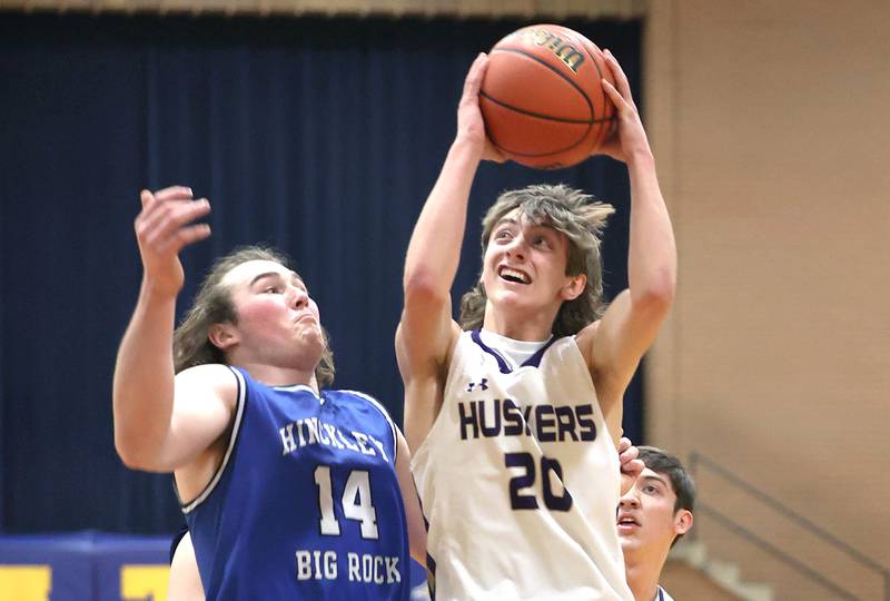 Serena's Bradley Armour goes to the basket against Hinckley-Big Rock's Martin Ledbetter Friday, Feb. 3, 2023, during the championship game of the Little 10 Conference Basketball Tournament at Somonauk High School.