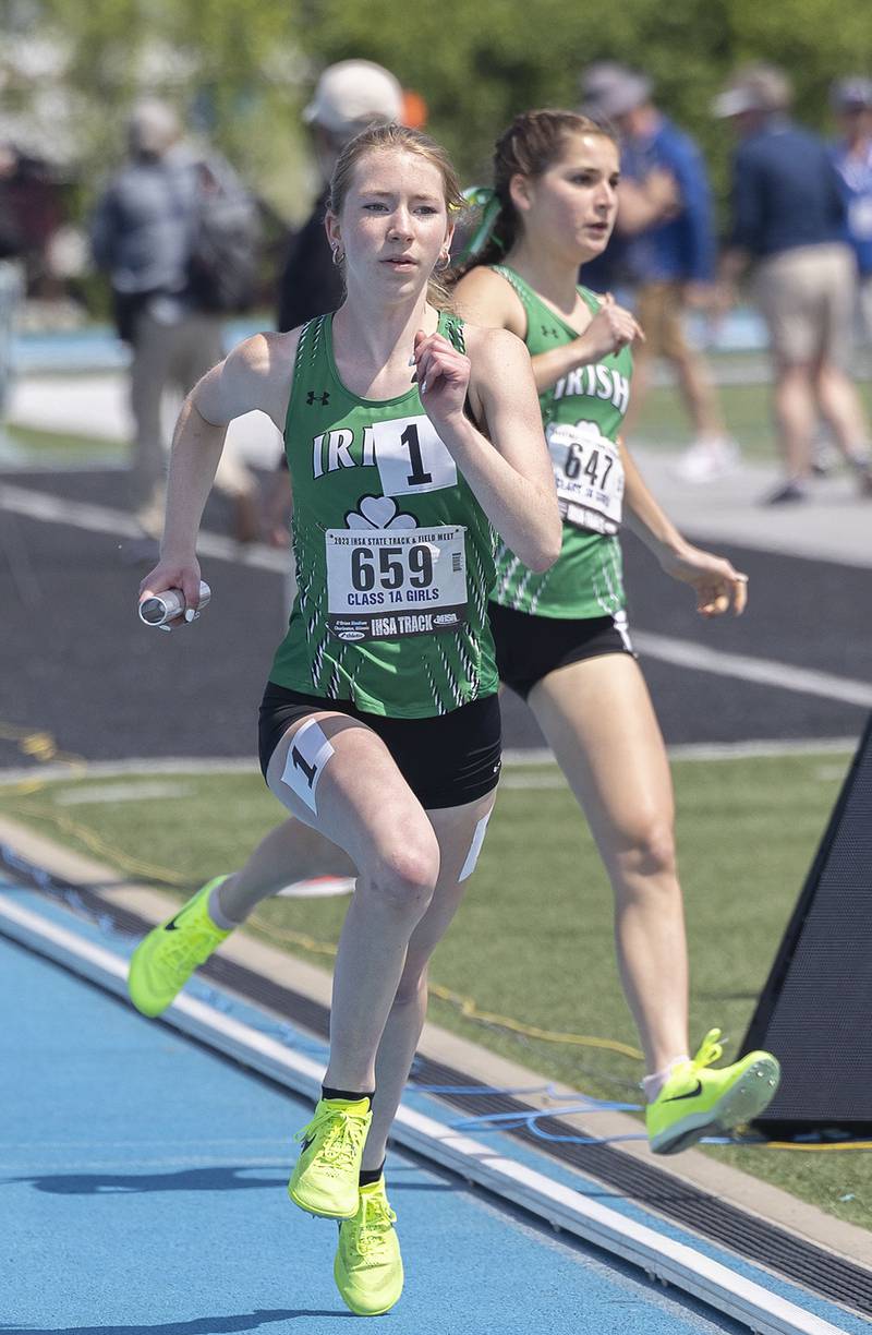 Seneca’s Evelyn O’Connor takes her leg of the race in the 4x700 Saturday, May 20, 2023 during the IHSA state track and field finals at Eastern Illinois University in Charleston.