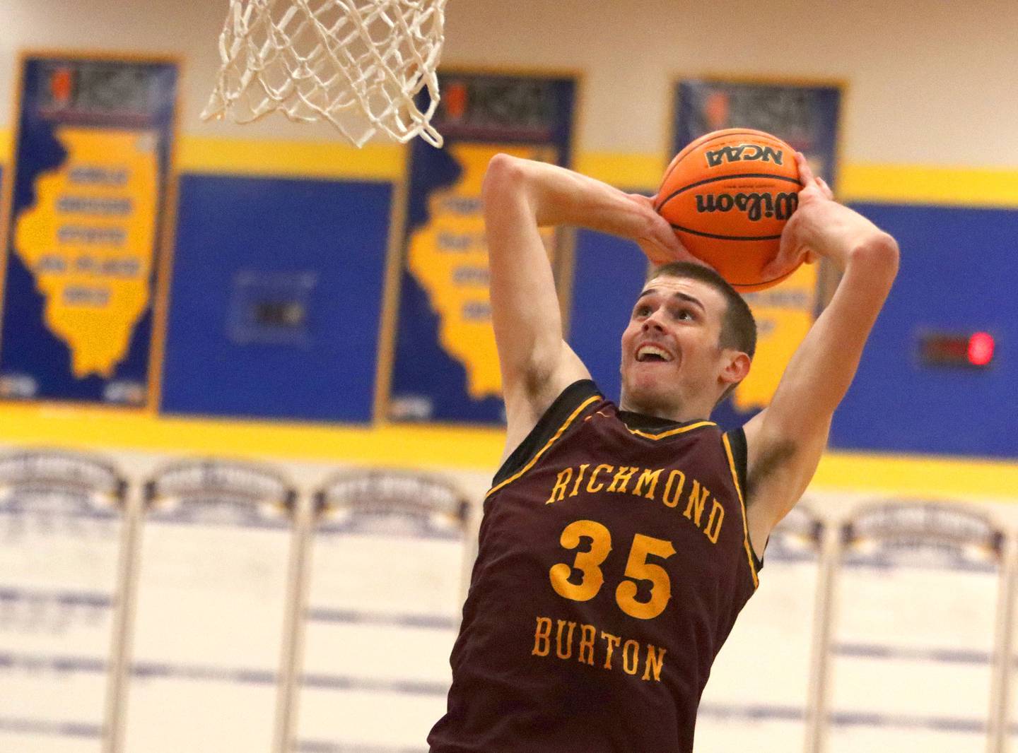 Richmond-Burton’s Jace Nelson glides in for a first-half slam dunk in varsity boys basketball onTuesday, Dec. 9, 2025, at Johnsburg High School in Johnsburg.
