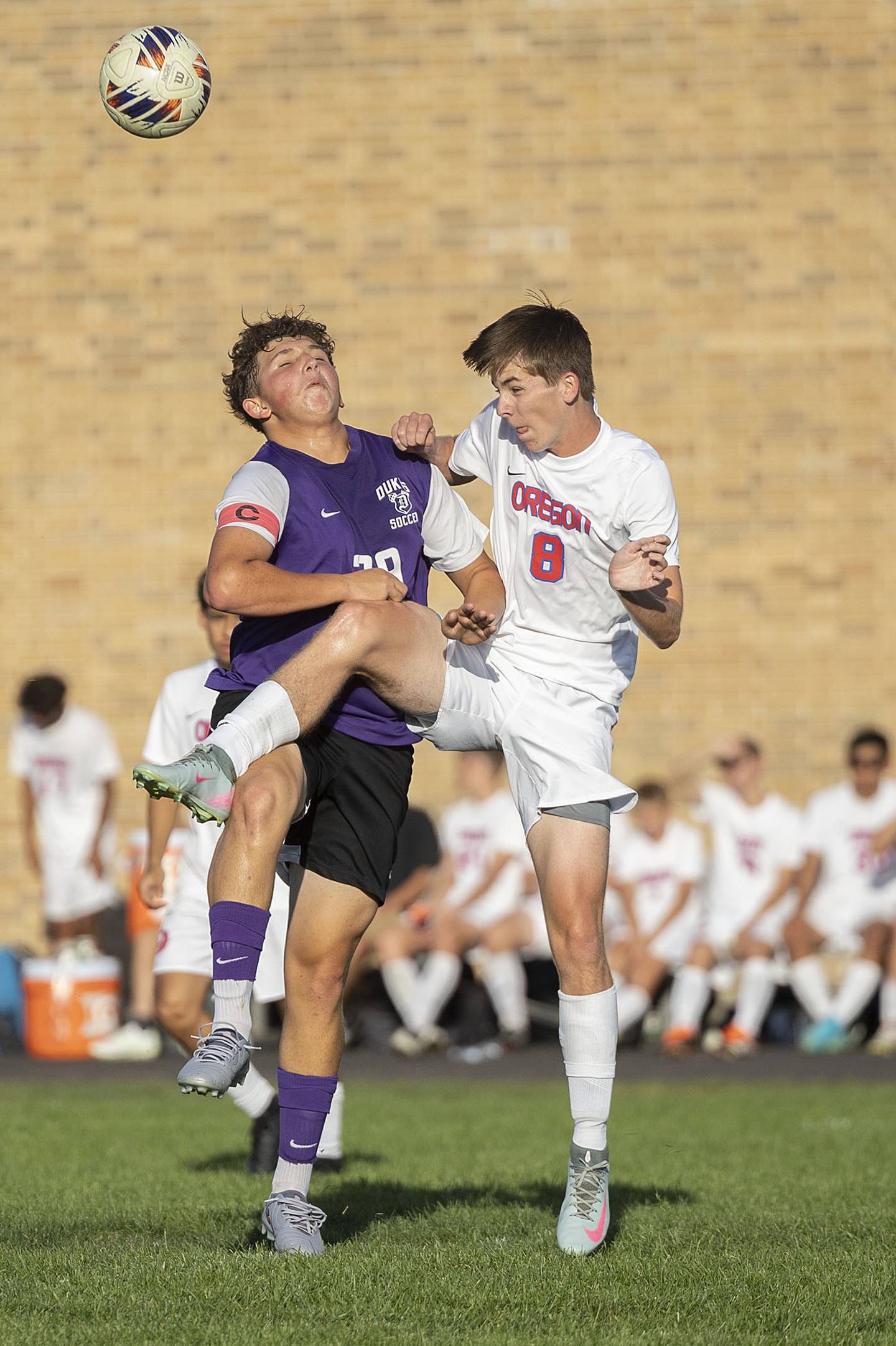 Dixon’s Jayvian Herwig and Oregon’s Nick Ciesel work for the ball Monday, Sept. 29, 2025.