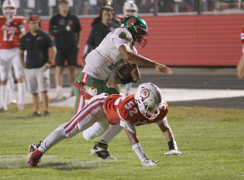 L-P quarterback Marion Persich shoves Ottawa's Diego Martinez to the ground to score a touchdown on Friday, Sept. 12, 2025 at King Field.