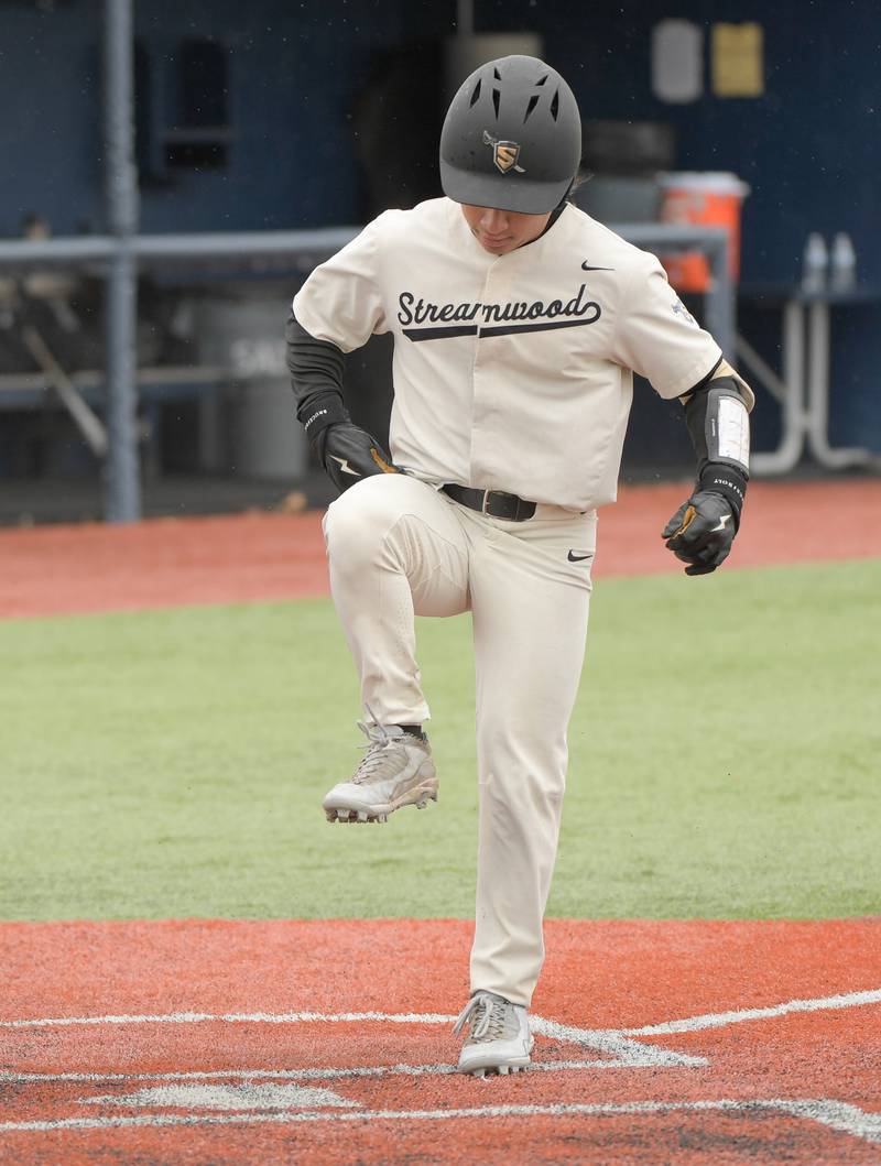 Streamwood's Antonio Alanis (1) celebrates his solo home run against Marengo during a game on Monday, March 25, 2024 in Carol Stream.