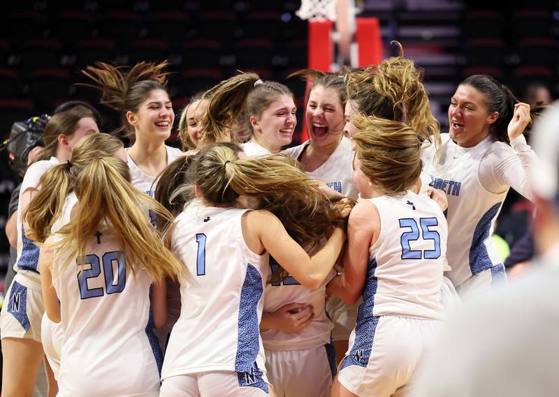 Nazareth Academy celebrates their win over Lincoln during the IHSA Class 3A girls basketball championship game at the CEFCU Arena on the campus of Illinois State University Saturday March 4, 2023 in Normal.