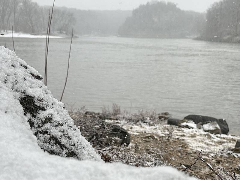 Snow sticks to a rock along the Illinois River on Thursday, Jan. 2, 2025 at Starved Rock State Park.