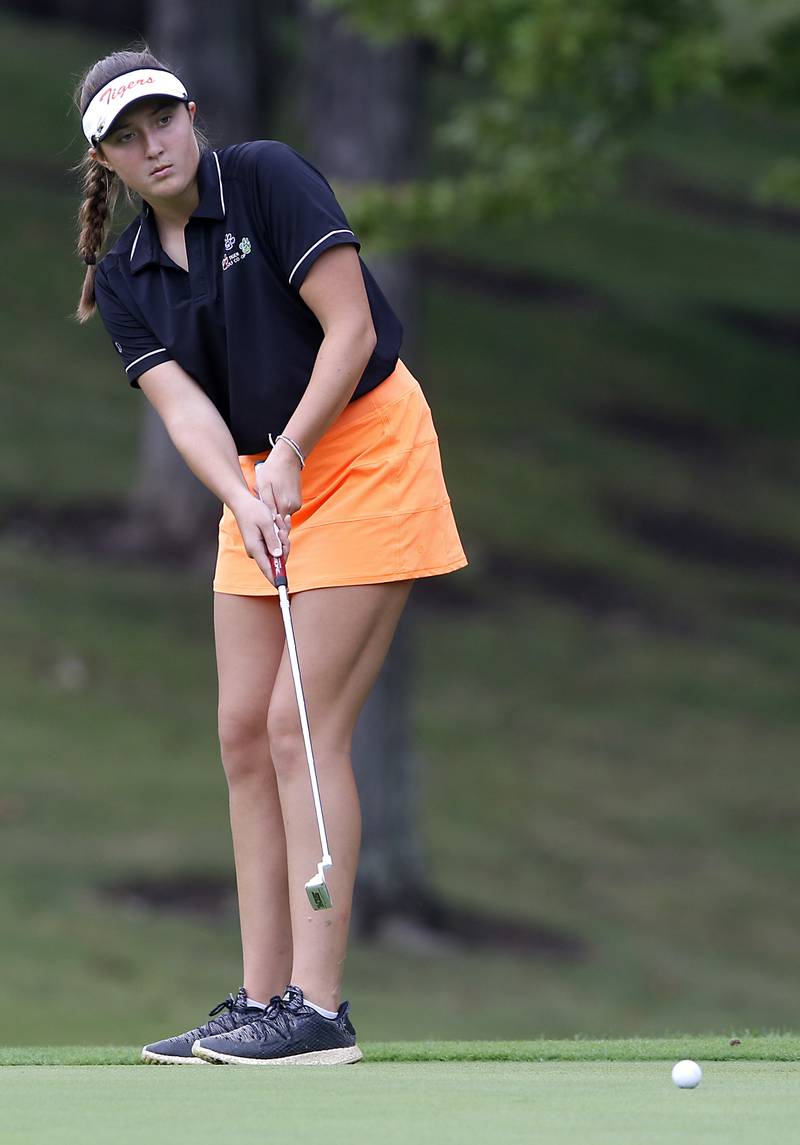 Crystal Lake Co-op’s Addison Cleary putts on 15th green during the Fox Valley Conference Girls Golf Tournament Wednesday, Sept. 20, 2023, at Crystal Woods Golf Club in Woodstock.