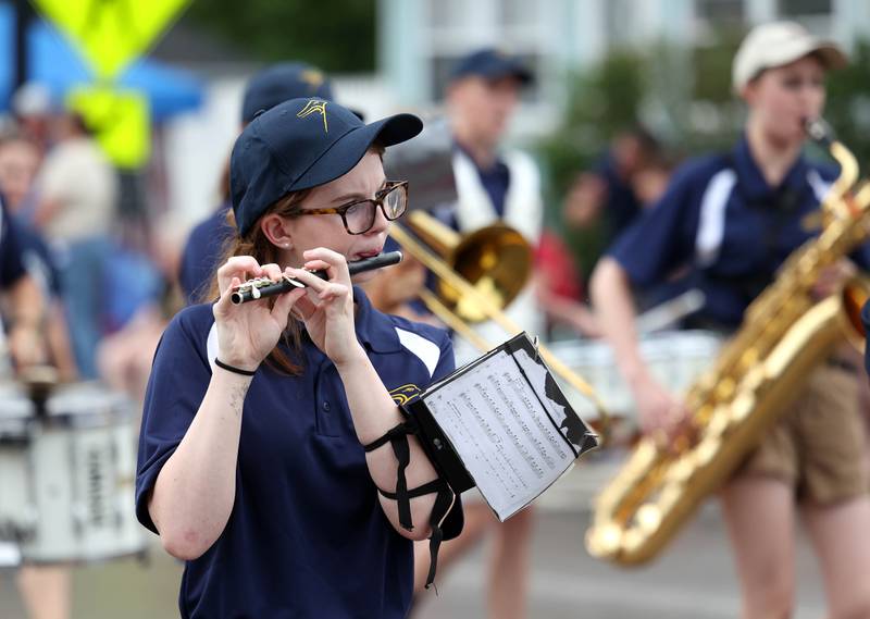 The Hiawatha High School marching band plays as they head down Main Street Friday, July 4, 2025, during the Fourth of July parade in downtown Kirkland.