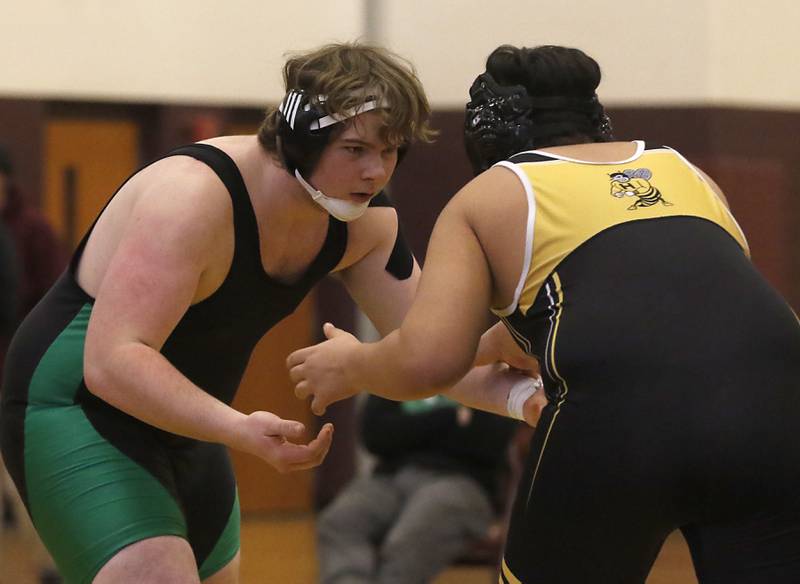 Aldren-Hebron’s Jesse Ambrust looks to take down Harvard’s Yair Morales their 285-pound third place wrestling match in the IHSA 1A Richmond-Burton Wrestling Regional Thursday, Jan. 19, 2023, at Richmond-Burton High School in Richmond.