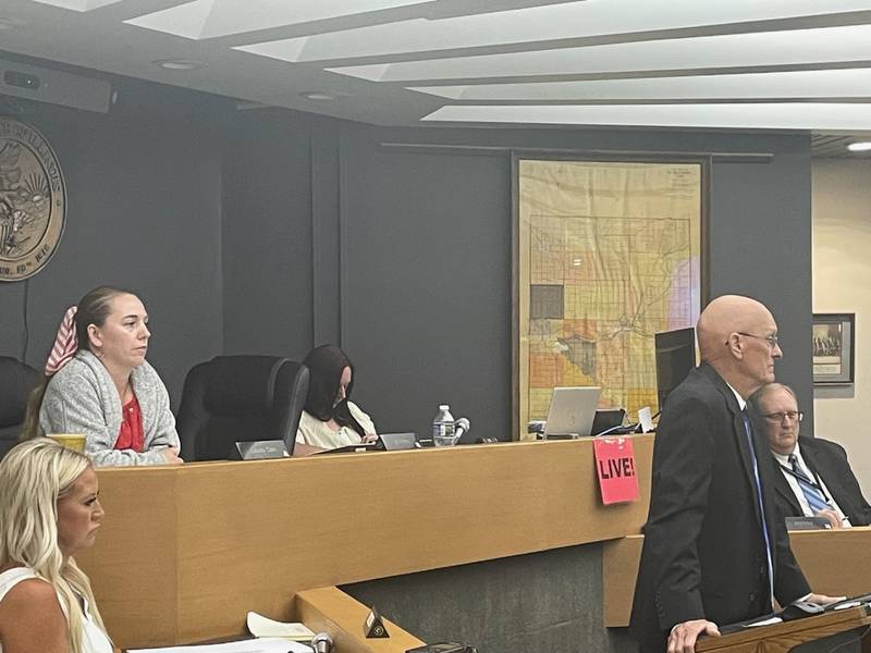 La Salle County Board Chairman Don Jensen (standing at the podium) expressed disapproval of a meme posted by County Clerk Jennifer Ebner (second from left), but urged forgiveness, during a La Salle County Board meeting Thursday, July 13, 2023.