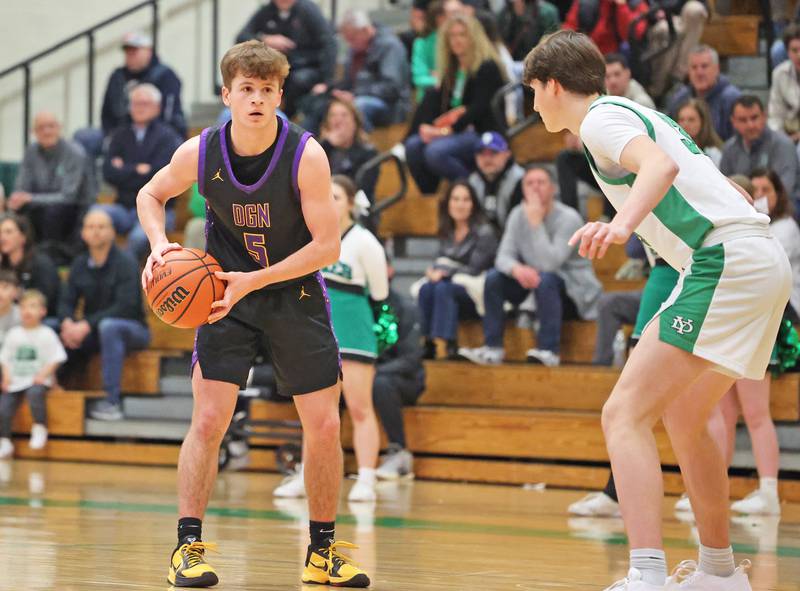 Downers Grove North’s Owen Thulin (5) looks for an outlet against York during a boys varsity basketball game on Saturday, Feb. 10, 2024 in Elmhurst, IL.