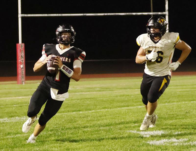 Riverdale Rams Marcus Bennett puts the pressure on EP's Keegan Winckler as he tries to find a man open in the endz one. The Panthers hosted the Rams for their homecoming game, and after an exciting back and forth contest, the Panthers won 42-36.