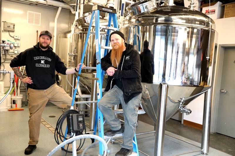 Obscurity head brewer Carson Souza (left) and Zak Beckman, who recently started as cider and mead maker, at the Obscurity Mead Hall and Cidery in Elburn.