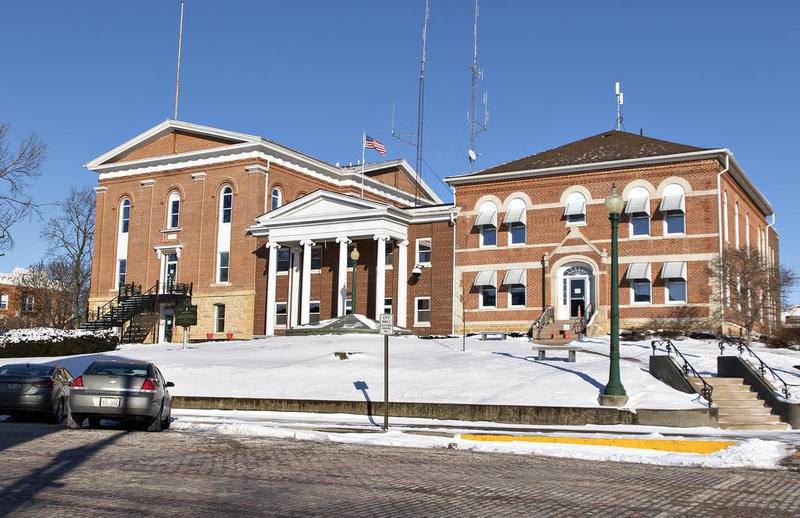 The public entrance at the Carroll County Courthouse now is located behind the white columns. In addition to a metal detector in the expanded lobby, the security camera system was upgraded and alarms were added to all exterior doors.