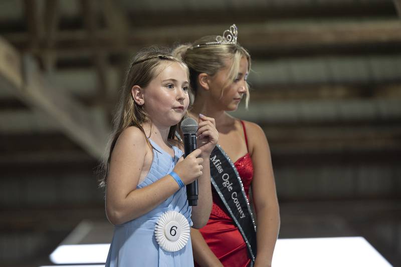 Alexis Feldhaus, 9, answers a question in the Ogle County Young Miss pageant Thursday, July 30, 2025, at the Ogle County Fairgrounds.