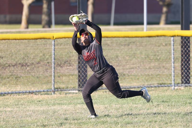Bolingbrook’s Diamond Samuels runs down the fly ball against Plainfield Central on Wednesday, March 20, 2024.