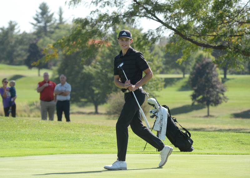 Riverdale's Aidan Dorathy smiles after sinking a putt at the 1A Lanark Regional at Lake Carroll Golf Course on Wednesday, Oct. 2, 2024. Dorathy shot a 71 to lead the Rams to the regional team title.