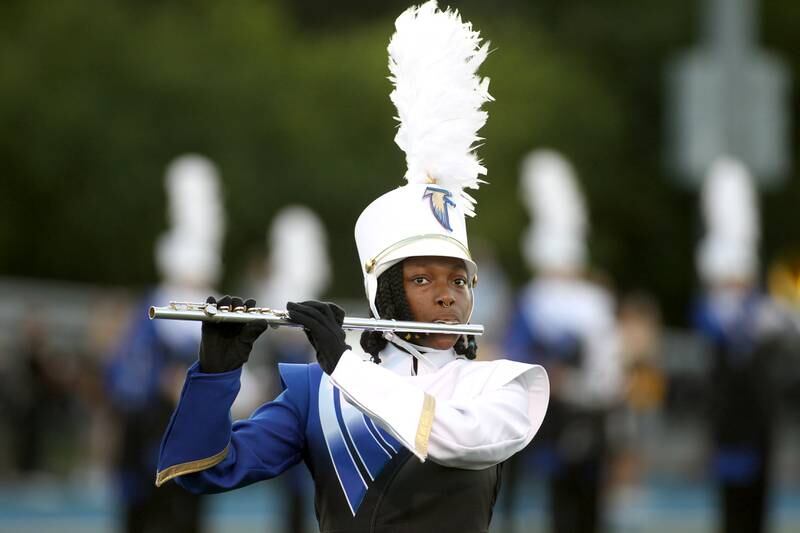 The Wheaton North Marching Band performs the National Anthem before a home game against Batavia on Friday, Sept. 9, 2022.